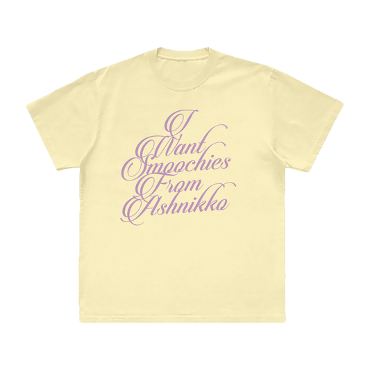 A butter yellow cotton tee with custom purple artwork from Ashnikko.
