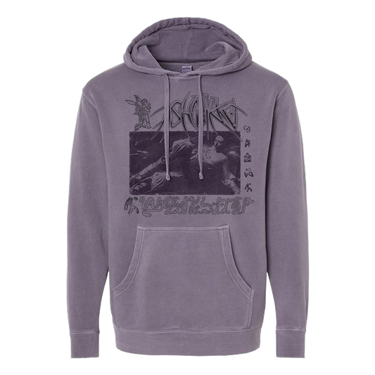 A pigment dyed purple hoodie with a photo of Ashnikko on the front. 